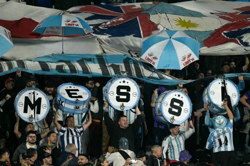 Argentine fans show drums spelling out "Messi" during the international friendly football match between Argentina and Burkina Faso at the Mas Monumental stadium in Buenos Aires on October 3, 2026. JUAN MABROMATA / AFP