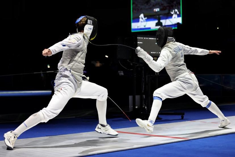 Individual Neutral Athlete Kirill Borodachev (R) and Belgium's Stef Van Campenhout compete in their men's foil individual bout during the FIE Fencing World Championships in Tbilisi on July 23, 2025. Giorgi ARJEVANIDZE / AFP