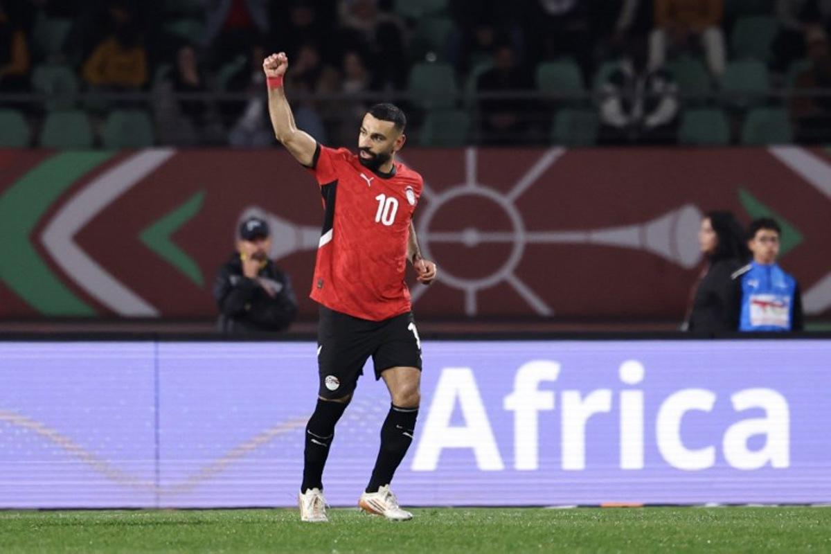 Egypt's forward #10 Mohamed Salah celebrates his goal during the Africa Cup of Nations (CAN) quarter-final football match between Egypt and Ivory Coast at the Grand stadium in Agadir on January 10, 2026. FRANCK FIFE / AFP
