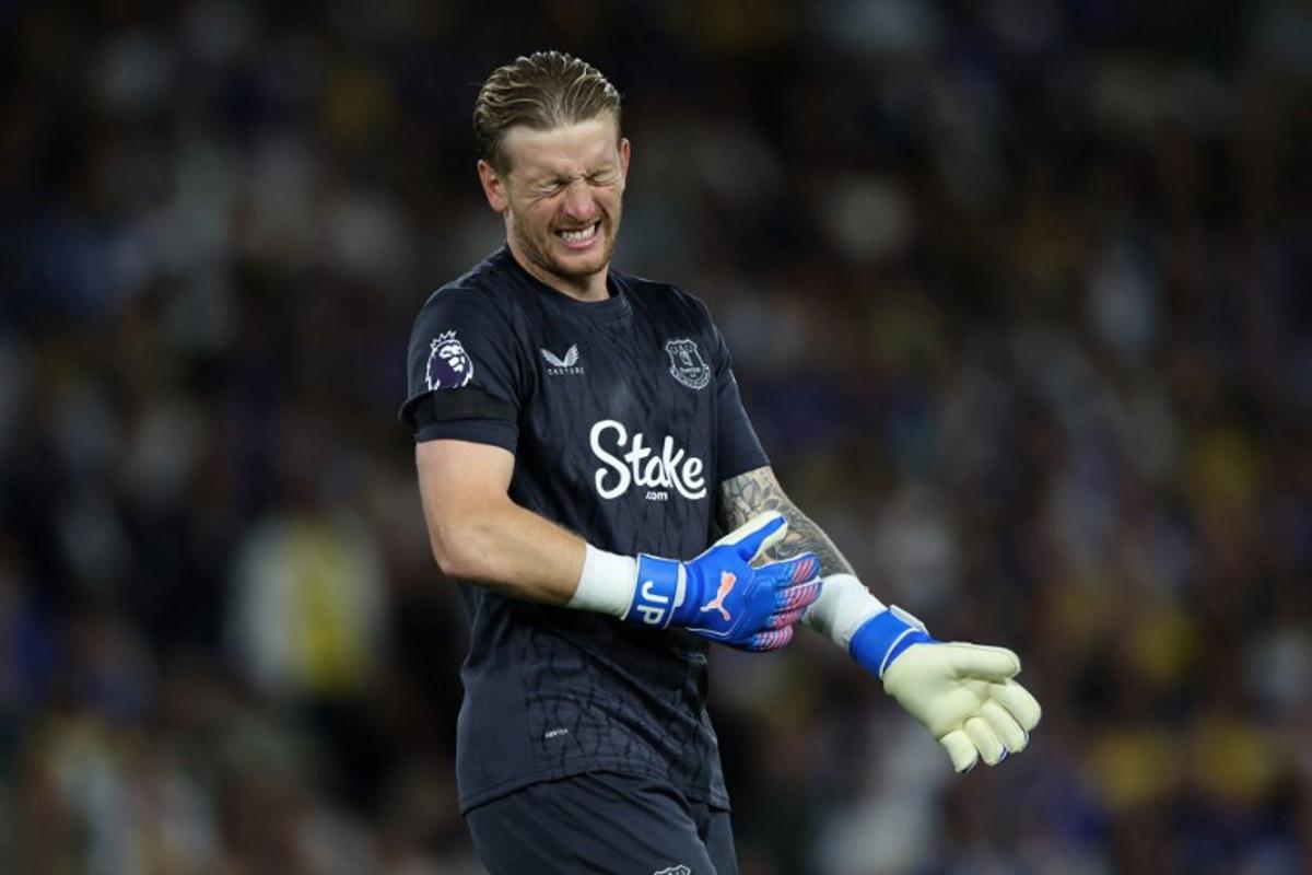 Everton's English goalkeeper #01 Jordan Pickford reacts during the English Premier League football match between Leeds United and Everton at Elland Road in Leeds, northern England on August 18, 2025. Darren Staples / AFP