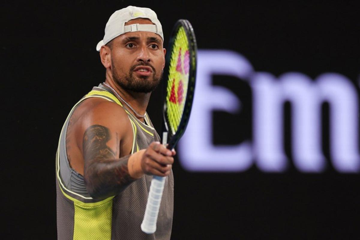 Australia's Nick Kyrgios reacts after a point against Australia's James Duckworth and Aleksandar Vukic during their men's doubles match on day five of the Australian Open tennis tournament in Melbourne on January 16, 2025. Adrian DENNIS / AFP