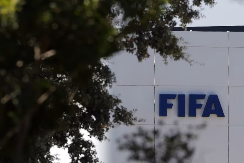 The FIFA logo is seen at its Africa regional office in Sale on August 5, 2026. President Gianni Infantino held emergency talks with other FIFA directors in Morocco on August 5, a source told AFP, amid a wave of criticism over his now shelved plan to open the World Cup to private investment. Abdelmajid BZIOUAT / AFP