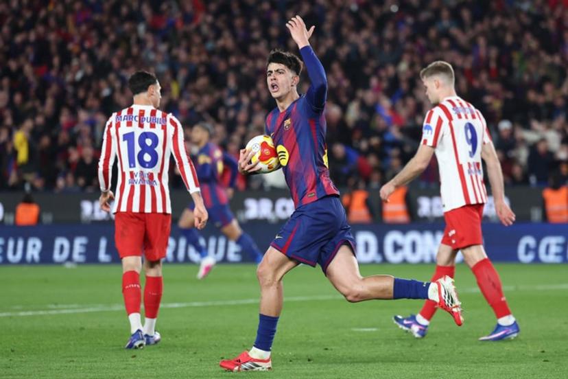 Barcelona's Spanish midfielder #22 Marc Bernal celebrates scoring his second goal during the Copa del Rey (King's Cup) semi final second leg football match between FC Barcelona and Club Atletico de Madrid at Camp Nou Stadium in Barcelona on March 3, 2026. Josep LAGO / AFP
