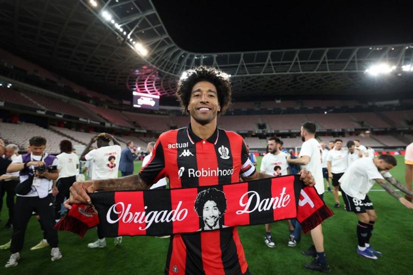 Nice's Brazilian defender #04 Dante celebrates after winning the L1-L2 playoff second-leg football match between first divison club OGC Nice and second division club AS Saint-Etienne at the Allianz Riviera Stadium in Nice, south-eastern France, on May 29, 2026. Valery HACHE / AFP
