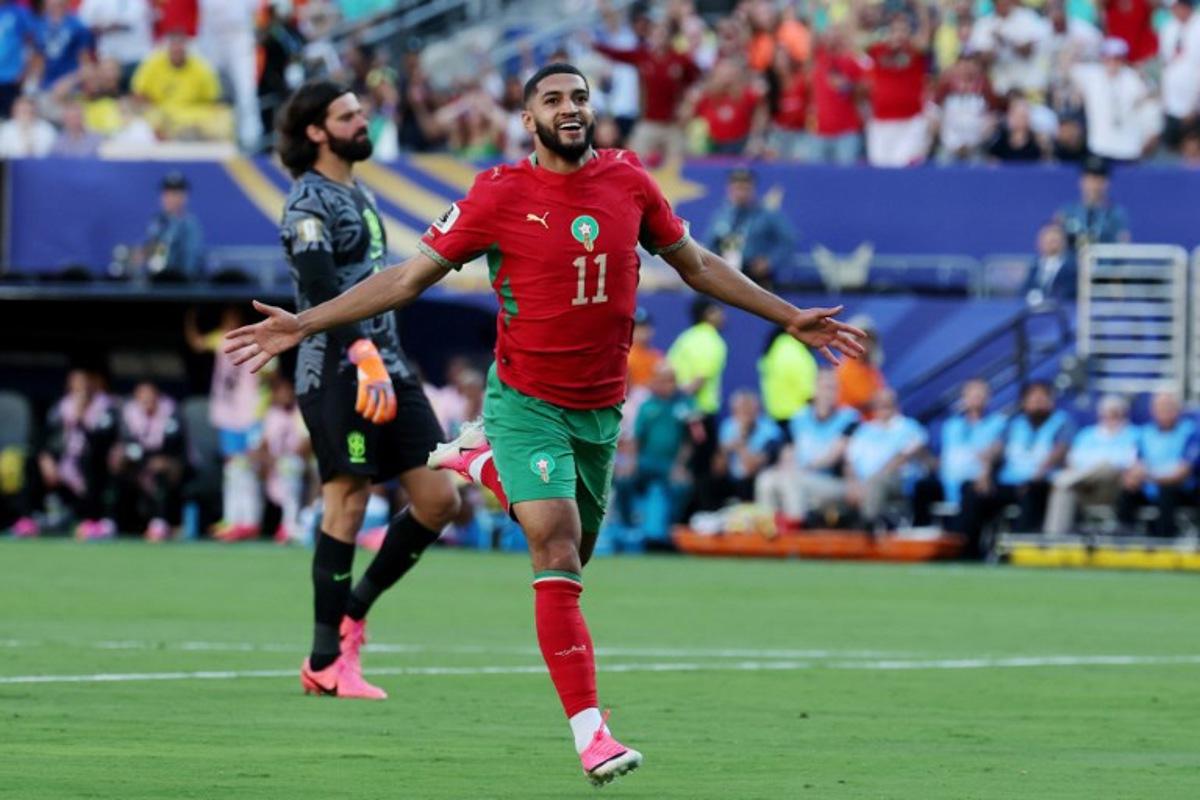 Morocco's midfielder #11 Ismael Saibari celebrates scoring his team's first goal during the 2026 World Cup Group C football match between Brazil and Morocco at the New York/New Jersey Stadium in East Rutherford on June 13, 2026. TIMOTHY A. CLARY / AFP