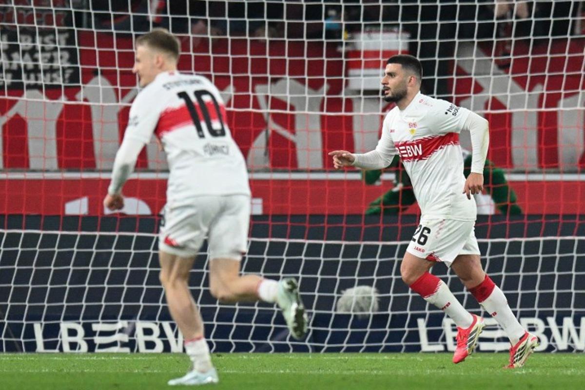 Stuttgart's German forward #26 Deniz Undav (R) celebrates scoring the opening goal with his teammates during the German first division Bundesliga football match between VfB Stuttgart and RB Leipzig in Stuttgart, southern Germany, on March 15, 2026. THOMAS KIENZLE / AFP