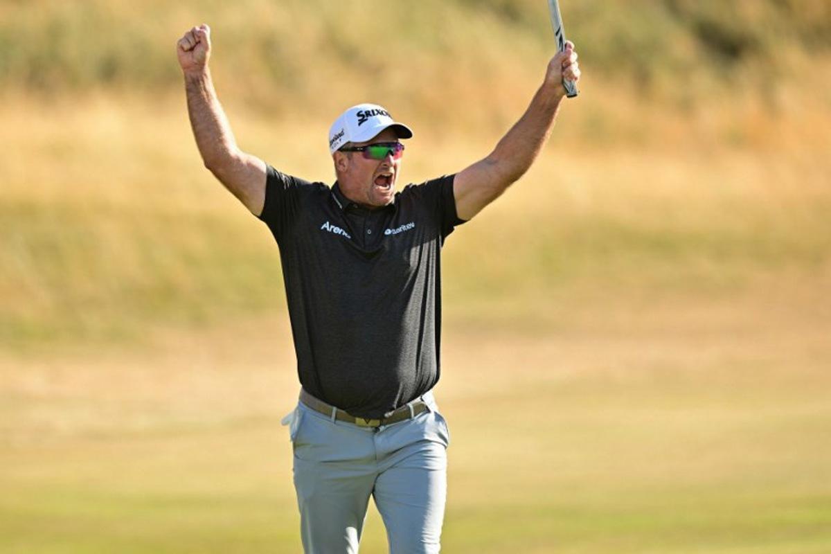 New Zealand's Ryan Fox celebrates holing his birdie putt on the 18th green to win on day four of the 154th Open Golf championship at Royal Birkdale Golf Club near Southport in north-west England on July 19, 2026. ANDY BUCHANAN / AFP