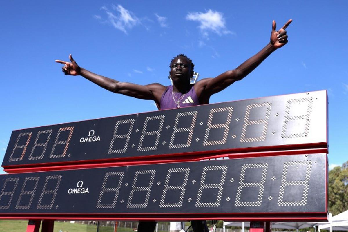 Australia's Gout Gout celebrates after winning the men's 200M final at the Australian Athletics Championships in Sydney on April 12, 2026. DAVID GRAY / AFP