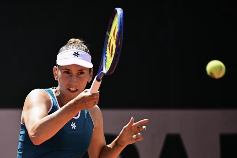 Belgium's Elise Mertens plays a forehand return to Poland's Maja Chwalinska during their women's singles match on day 5 of the French Open tennis tournament at the Roland-Garros Complex in Paris on May 28, 2026. JULIEN DE ROSA / AFP