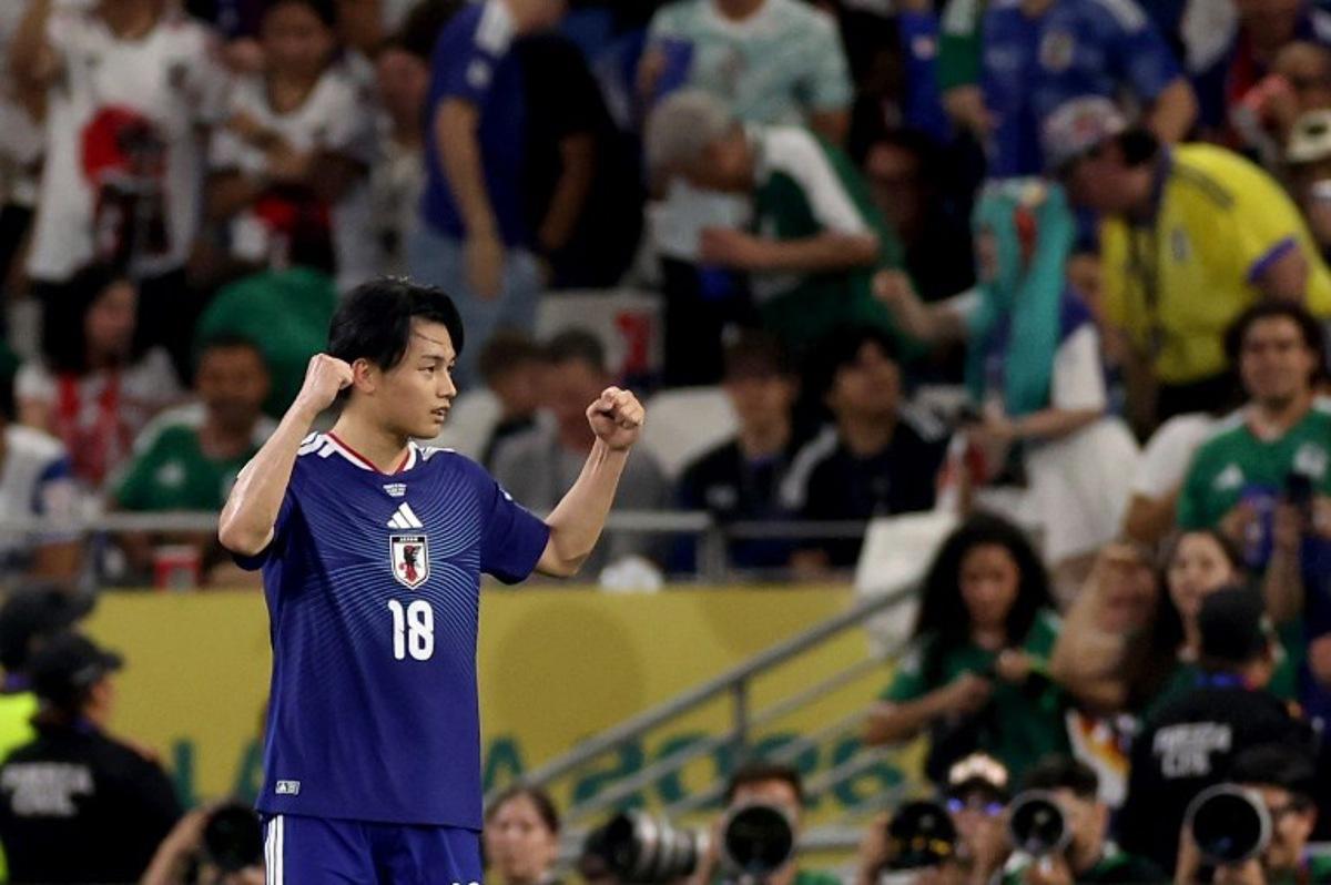Japan's forward #18 Ayase Ueda celebrates after scoring his team second goal during the 2026 World Cup Group F football match between Tunisia and Japan at the Monterrey Stadium in Guadalupe, Mexico, on June 20, 2026. Julio Cesar AGUILAR / AFP