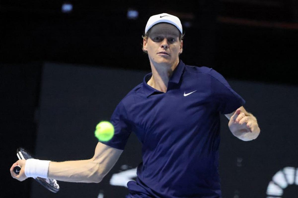 Italy's Jannik Sinner returns the ball to Greece's Stefanos Tsitsipas during the quarter-final of the Six Kings Slam exhibition tennis tournament in Riyadh on October 15, 2025. Fayez NURELDINE / AFP