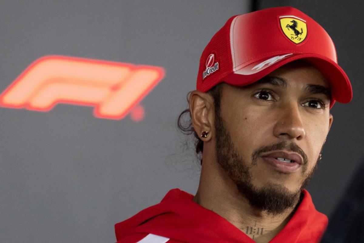 Ferrari's British driver Lewis Hamilton talks to the media in the paddock ahead of the Formula One Hungarian Grand Prix at the Hungaroring circuit in Mogyorod near Budapest, Hungary, on July 23, 2026. Andrej ISAKOVIC / AFP