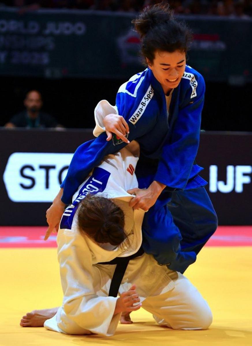 Hungary's Jennifer Czerlau competes against Belgium's Gabriella Willems in the women's -70kgs qualification round of the Judo World Championships at Papp Laszlo Arena in Budapest, Hungary, on June 17, 2025. Ferenc ISZA / AFP