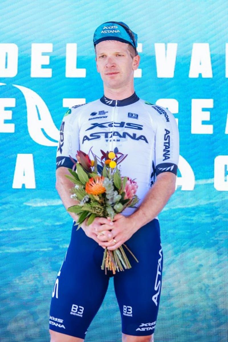 Second-placed New Zealand's Aaron Murray Gate of XDS Astana Team stands on the podium after the men's elite cycling event of the 2025 Cadel Evans Great Ocean Road Race in Geelong on February 2, 2025. CHRIS PUTNAM / AFP
