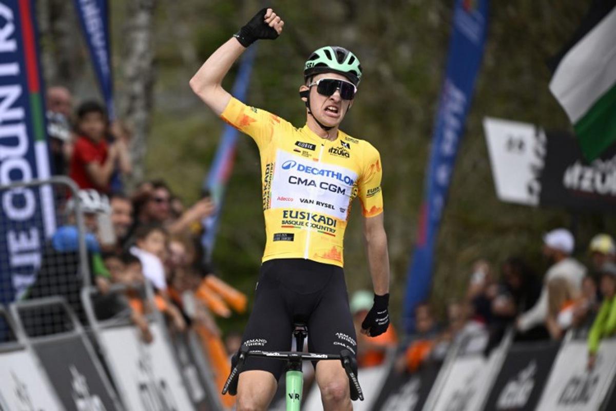 Current overall ranking leader Team Decathlon CMA CGM's French rider Paul Seixas celebrates winning the second stage of the Basque Country's Itzulia cycling tour, a 164.1 km race between Pamplona and Mendukilo cave, near Astitz, on April 7, 2026. French youngster Paul Seixas stretched his overall lead at the Tour of the Basque Country today after a powerful breakaway on the final main climb of the second stage. ANDER GILLENEA / AFP