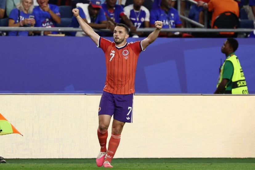 Scotland's midfielder #07 John McGinn celebrates after scoring his team's first goal during the 2026 World Cup Group C football match between Haiti and Scotland at the Boston Stadium in Foxborough on June 13, 2026. FRANCK FIFE / AFP