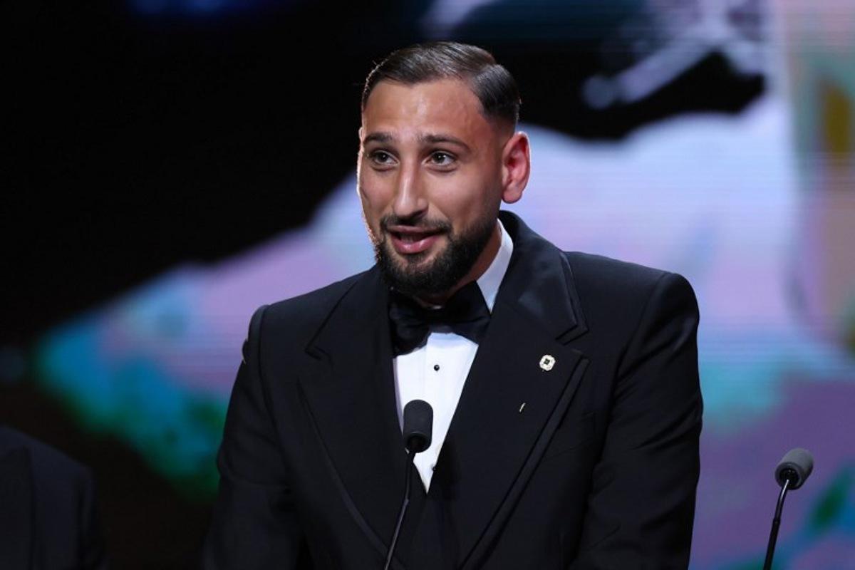 Italy's goalkeeper Gianluigi Donnarumma speaks after receiving the Yashin Trophy for the best male goalkeeper during the 2025 Ballon d'Or France Football award ceremony at the Theatre du Chatelet in Paris on September 22, 2025. Franck FIFE / AFP