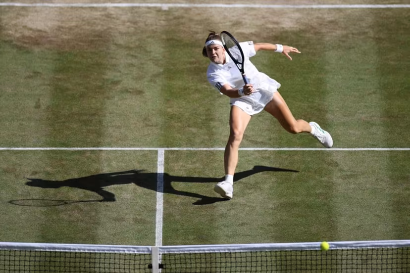 Czech Republic's Karolina Muchova returns against Japan's Naomi Osaka during their women's singles quarter-final tennis match on the ninth day of the 2026 Wimbledon Championships at The All England Lawn Tennis and Croquet Club in Wimbledon, southwest London, on July 7, 2026. Henry NICHOLLS / AFP