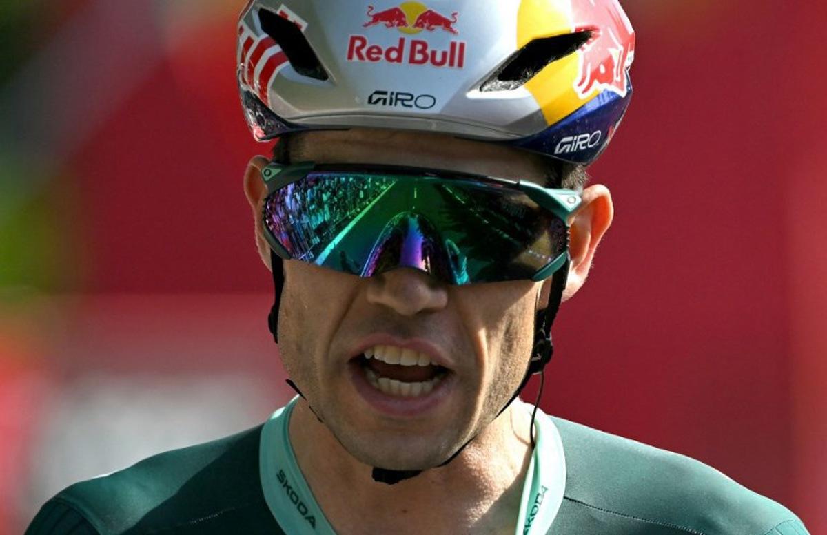 Team Visma-Lease a bike's Belgian rider Wout van Aert celebrates winning the 15th stage of the Vuelta a Espana 2026 cycling tour, a 110,2 km race which was modified from the original itinerary of 189,7 km following the activation of the high temperature protocal, between Palma del Rio and Cordoba, on September 6, 2026. JORGE GUERRERO / AFP