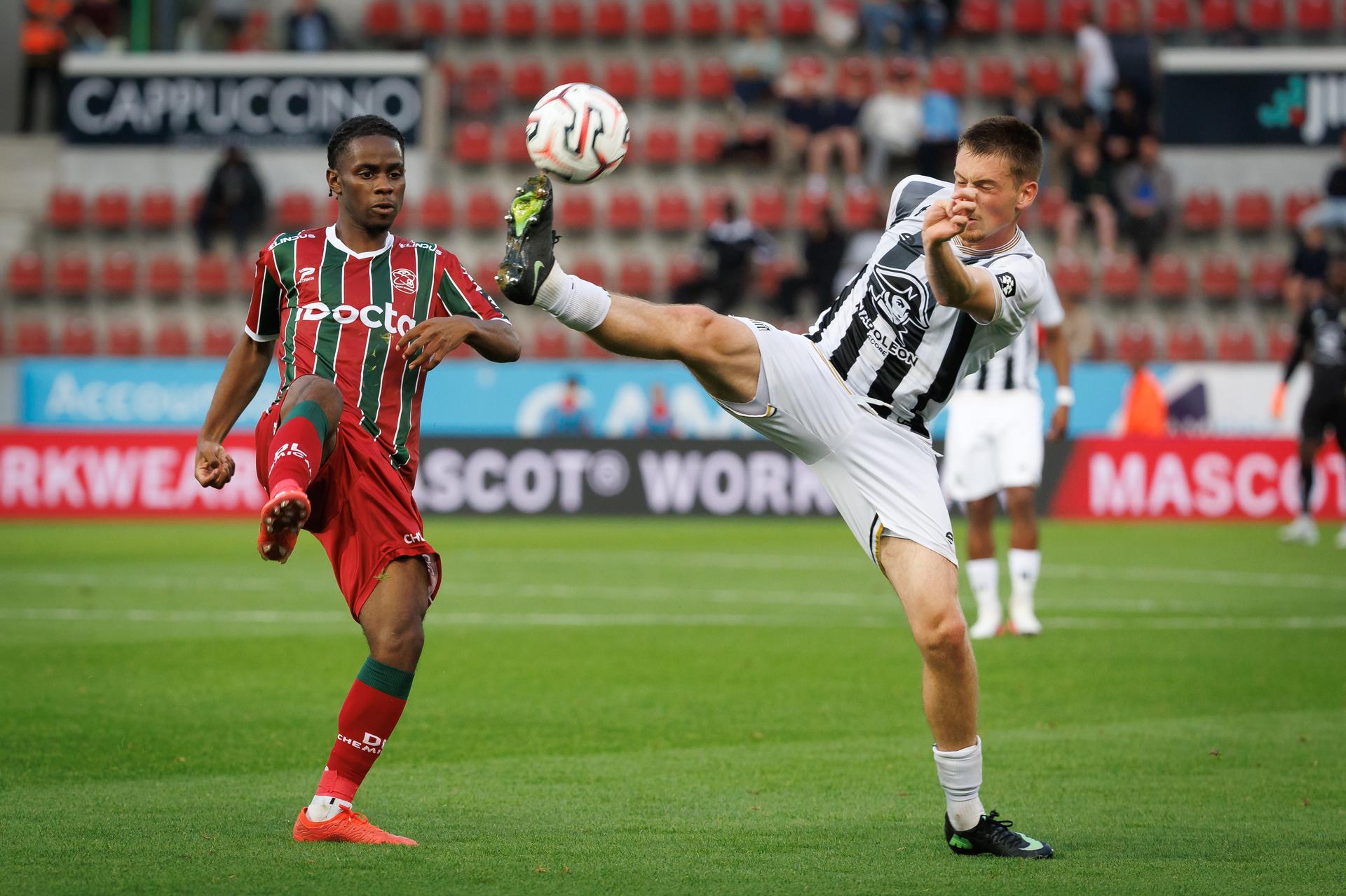 Essevee's Franz Tangala and Charleroi's Jakob Romsaas fight for the ball during a soccer match between SV Zulte Waregem and Sporting Charleroi, Sunday 13 September 2026 in Waregem, on day 6 of the 2026-2027 'Jupiler Pro League' first division of the Belgian championship. BELGA PHOTO KURT DESPLENTER