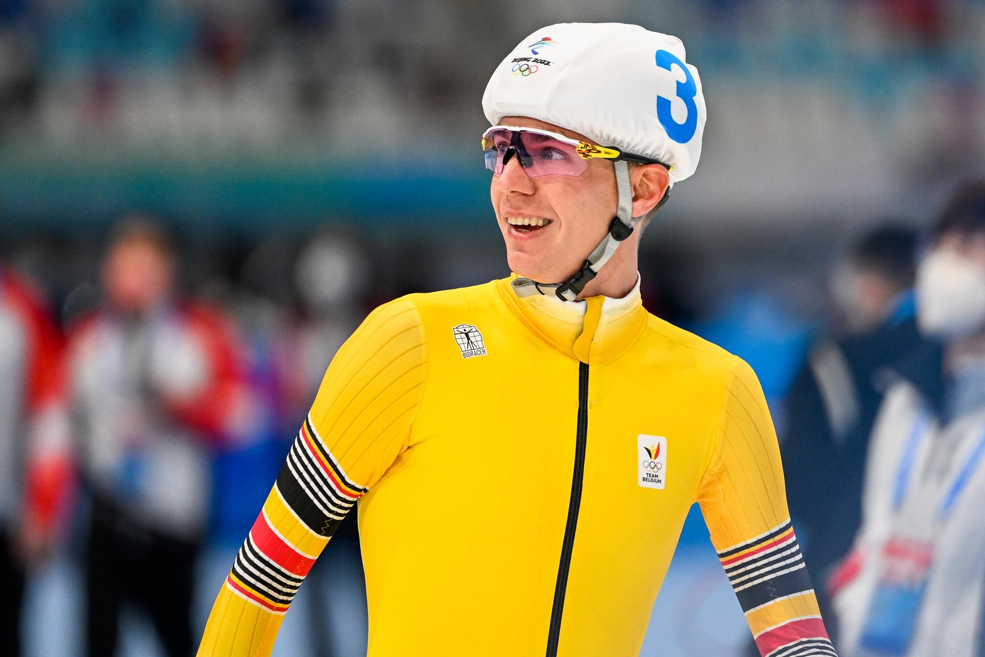 Belgian speed skater Bart Swings celebrates as he crosses the finish line to win the final of the men's mass start speed skating event at the Beijing 2022 Winter Olympics in Beijing, China, Saturday 19 February 2022. The winter Olympics are taking place from 4 February to 20 February 2022. BELGA PHOTO LAURIE DIEFFEMBACQ
