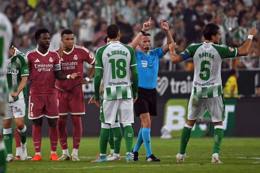 Spanish referee Alejandro Hernandez signals offside and disallows the goal scored by Real Madrid's Spanish forward #19 Carlos Espi Escrihuela during the Spanish league football match between Real Betis and Real Madrid CF at Benito Villamarin Stadium in Seville on September 4, 2026. JORGE GUERRERO / AFP