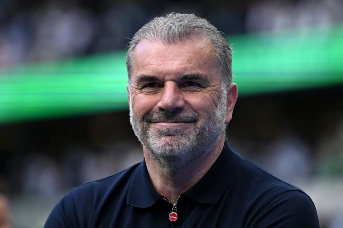 Tottenham Hotspur's Greek-Australian Head Coach Ange Postecoglou applauds the fans following the English Premier League football match between Tottenham Hotspur and Brighton and Hove Albion at the Tottenham Hotspur Stadium in London, on May 25, 2025. JUSTIN TALLIS / AFP