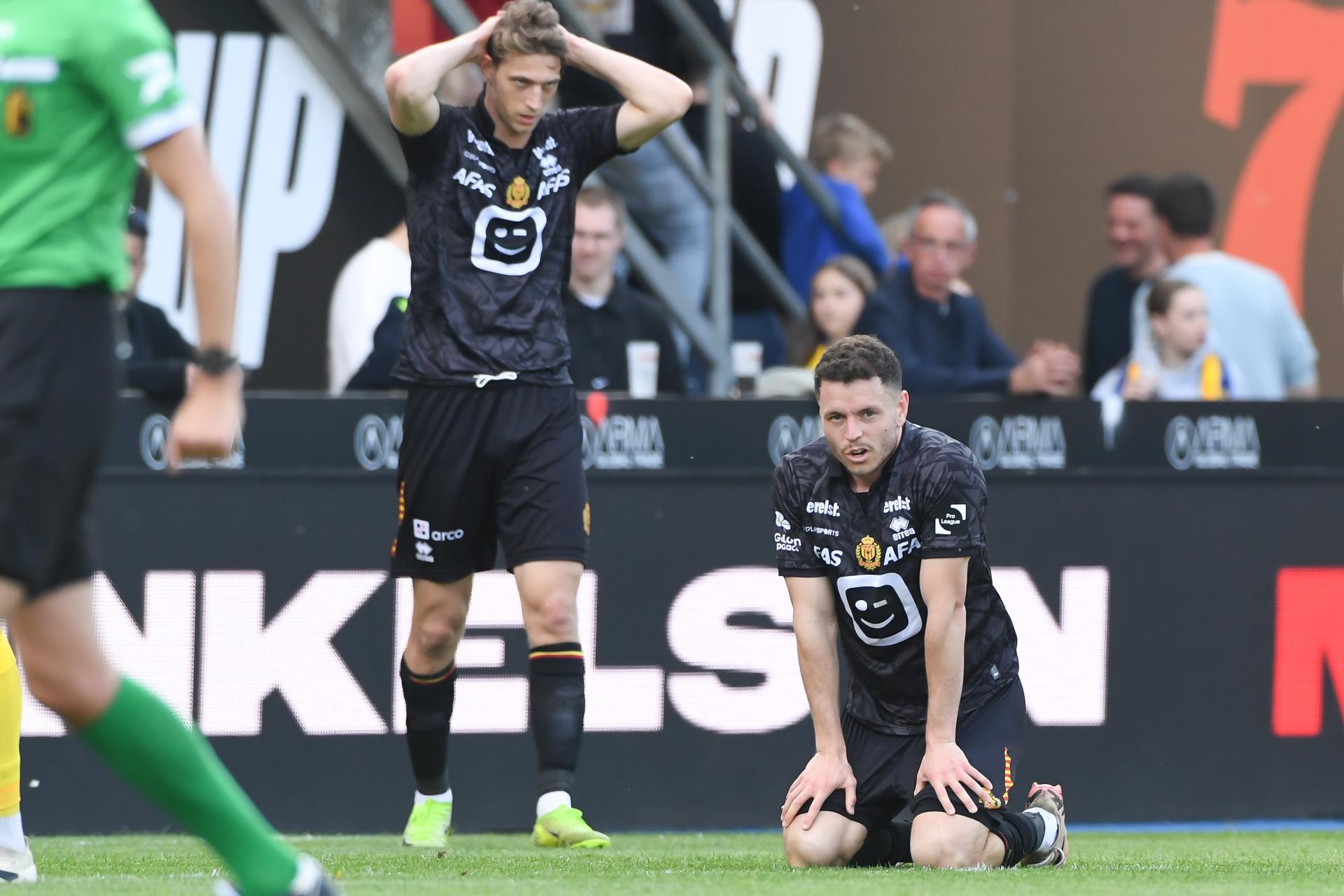 Mechelen's Lion Lauberbach and Mechelen's Kerim Mrabti look dejected during a soccer match between KVC Westerlo and KV Mechelen, Saturday 26 April 2025 in Mechelen, on day 6 (out of 10) of the Europe Play-offs of the 2024-2025 'Jupiler Pro League' first division of the Belgian championship. BELGA PHOTO JILL DELSAUX