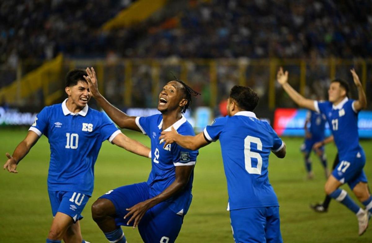 El Salvador players celebrate after a Suriname's own goal during the 2026 FIFA World Cup Concacaf qualifier football match between El Salvador and Suriname at the Cuscatlan Stadium in San Salvador on September 8, 2025. Marvin RECINOS / AFP