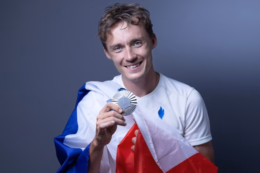 Silver medallist of the men's cycling road race France's Valentin Madouas poses during a photo session in Paris on August 4, 2024. JOEL SAGET / AFP