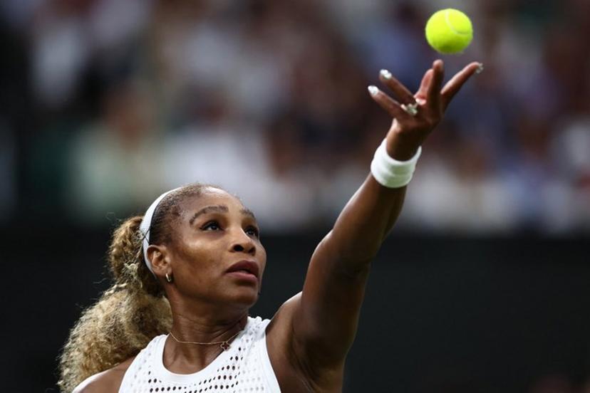 US player Serena Williams serves the ball to Australia's Maya Joint during their women's singles first round tennis match on the second day of the 2026 Wimbledon Championships at The All England Lawn Tennis and Croquet Club in Wimbledon, southwest London, on June 30, 2026. HENRY NICHOLLS / AFP