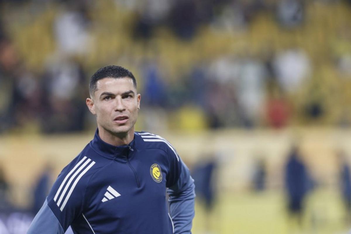 Nassr's Portuguese forward #07 Cristiano Ronaldo reacts during warm up prior to the Saudi Pro League football match between Al-Nassr and Al-Khaleej at Al-Awwal Park in Riyadh on November 23, 2025. Fayez NURELDINE / AFP
