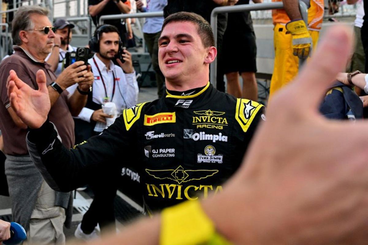 Invicta Racing's Italian driver Leonardo Fornaroli celebrates his Formula 2 title ahead of the Formula One Qatar Grand Prix at the Lusail International Circuit in Lusail on November 30, 2025. Andrej ISAKOVIC / AFP