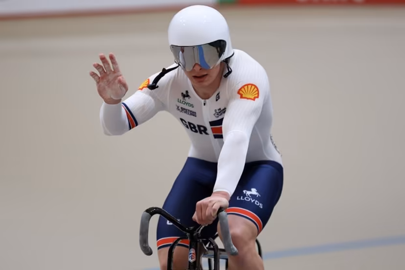 Great Britain's #121 Matthew Richardson celebrates winning silver in the men's sprint final at the 2025 UCI Track World Championships, in the Penalolen Velodrome in Santiago, on October 26, 2025. Javier TORRES / AFP