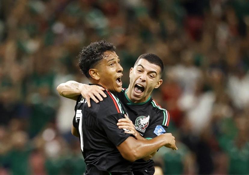 Mexico's midfielder #07 Luis Romo celebrates with teammate midfielder #06 Erik Lira scoring his team's first goal during the 2026 World Cup Group A football match between Mexico and South Korea at the Guadalajara Stadium in Zapopan on June 18, 2026. Ulises RUIZ / AFP