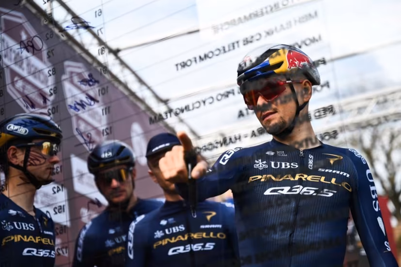 Pinarello-Q36.5 Pro Cycling Team's British Thomas Pidcock signs ahead of the 20th one-day classic 'Strade Bianche' (White Roads) men's cycling race between Siena and Siena in Tuscany on March 7, 2026. Marco BERTORELLO / AFP