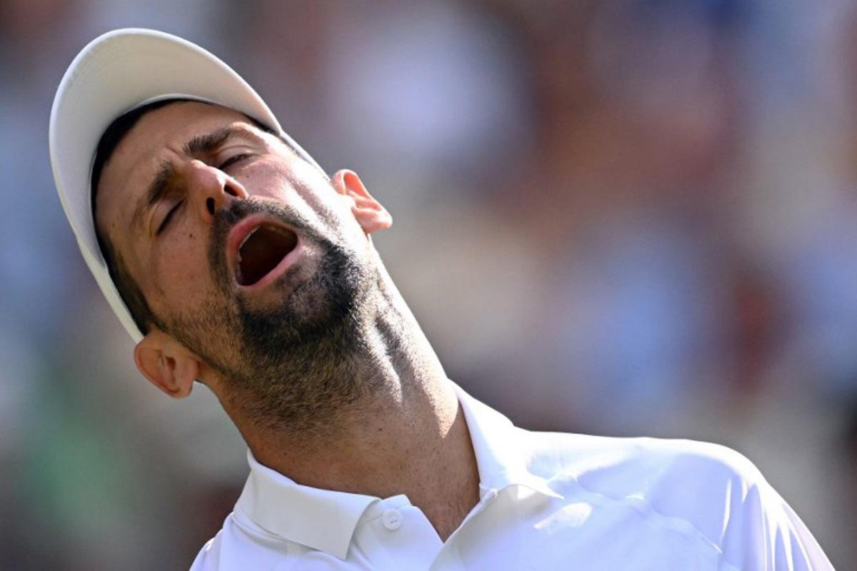 Serbia's Novak Djokovic reacts as he plays against Italy's Jannik Sinner during their men's singles semi-final tennis match on the twelfth day of the 2026 Wimbledon Championships at The All England Lawn Tennis and Croquet Club in Wimbledon, southwest London, on July 10, 2026. Kirill KUDRYAVTSEV / AFP