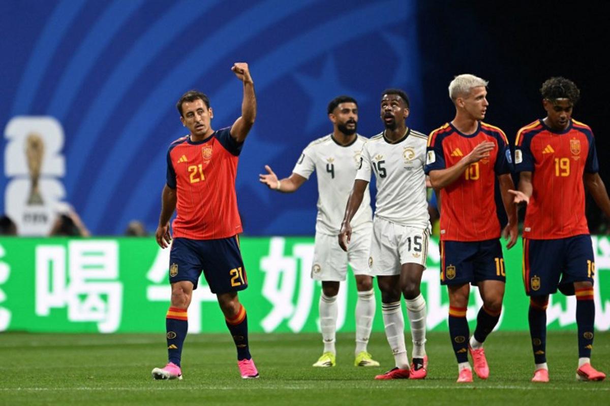 Spain's forward #21 Mikel Oyarzabal (L) celebrates after scoring his team's second goal during the 2026 World Cup Group H football match between Spain and Saudi Arabia at the Atlanta Stadium in Atlanta on June 21, 2026. ROBERTO SCHMIDT / AFP