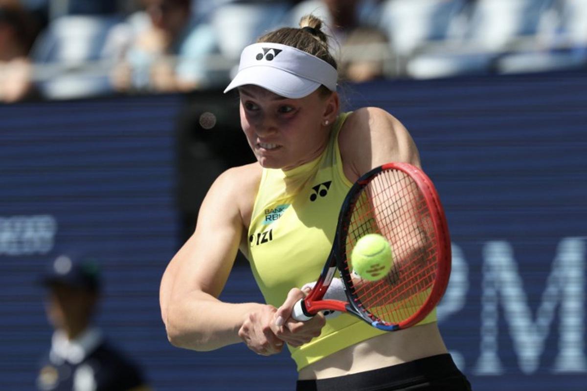 Kazakhstan's Elena Rybakina hits a return against China's Zheng Qinwen during their women's singles quarter-final tennis match on day eleven of the US Open tennis tournament at the USTA Billie Jean King National Tennis Center in New York City on September 9, 2026. TIMOTHY A. CLARY / AFP
