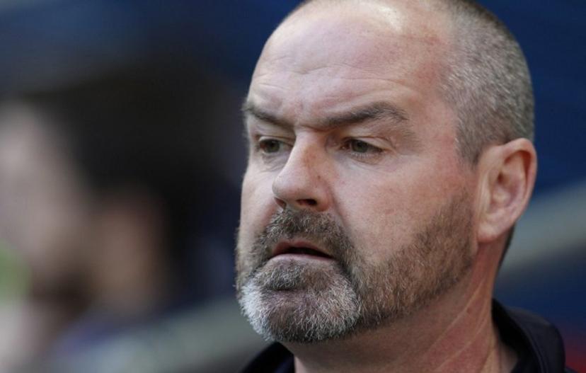 Reading's manager Steve Clarke sits prior to the start of the FA Cup semi-final between Arsenal and Reading at Wembley stadium in London on April 18, 2015. AFP PHOTO / IAN KINGTON NOT FOR MARKETING OR ADVERTISING USE / RESTRICTED TO EDITORIAL USE IAN KINGTON / AFP