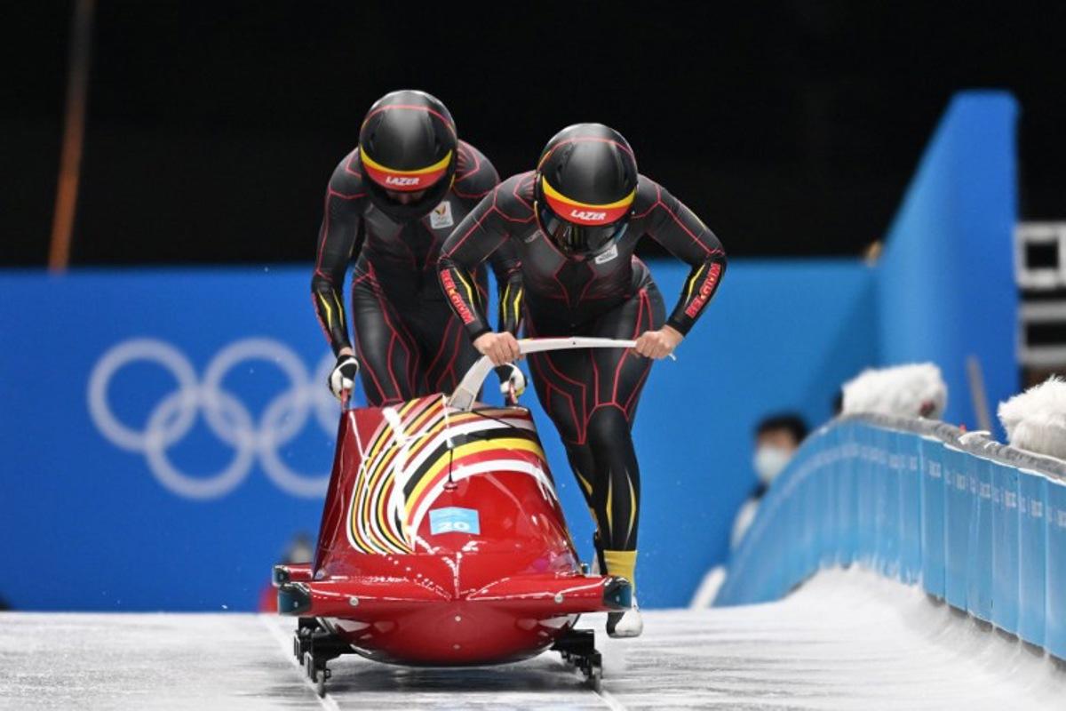 Belgium's An Vannieuwenhuyse and Sara Aerts compete in the 2-woman bobsleigh event at the Yanqing National Sliding Centre during the Beijing 2022 Winter Olympic Games in Yanqing on February 18, 2022. Daniel MIHAILESCU / AFP