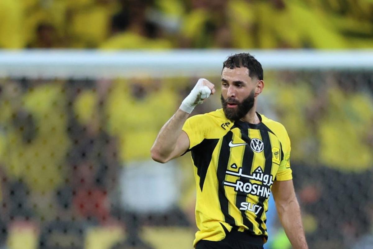 Ittihad's French forward #09 Karim Benzema reacts after scoring during the King's Cup final match between Ittihad FC and Qadsiah FC at the King Abdullah Sport City Stadium in Jeddah on May 30, 2025. Abdel Ghani BASHIR / AFP