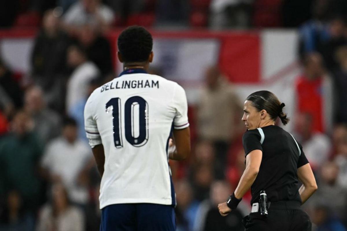 England's midfielder #10 Jude Bellingham reacts after his goal is disallowed by referee Stephanie Frappart during the international friendly football match between England and Senegal at the City Ground stadium, in Nottingham, on June 10, 2025. Paul ELLIS / AFP