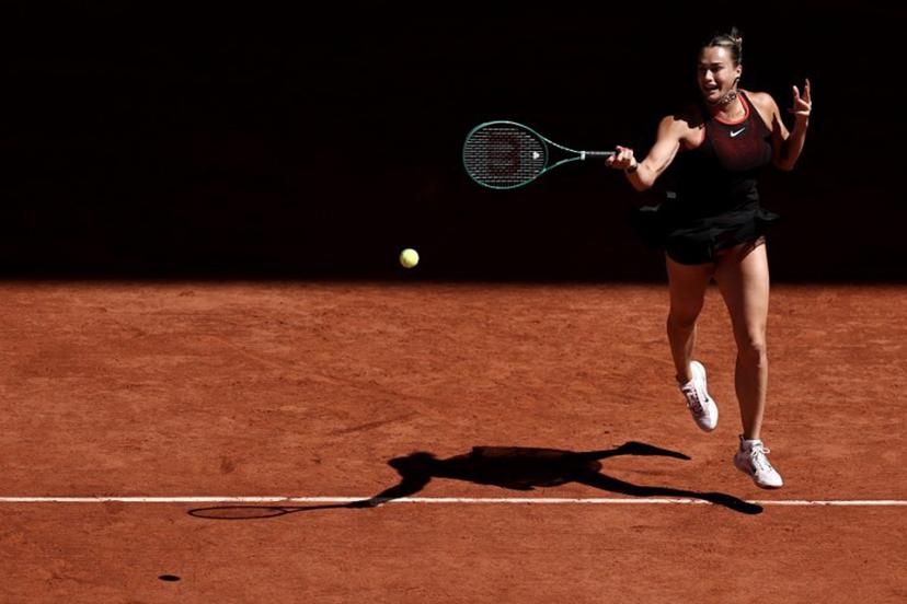 Belarus' Aryna Sabalenka plays a forehand return to Spain's Jessica Bouzas Maneiro during their women's singles match on day 3 of the French Open tennis tournament on Court Philippe-Chatrier at the Roland-Garros Complex in Paris on May 26, 2026. Anne-Christine POUJOULAT / AFP