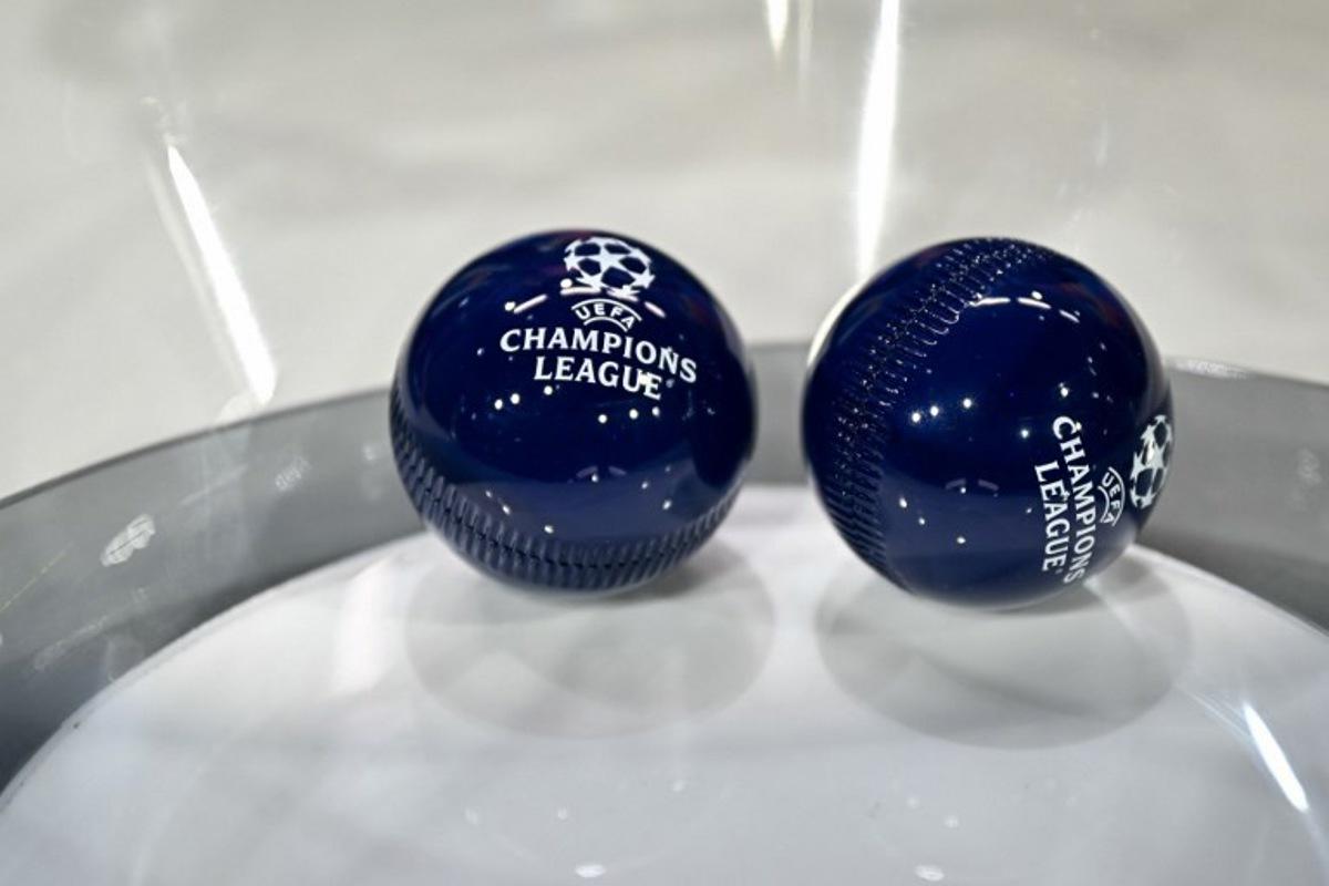 This photograph shows the draw balls bearing the competition logo ahead of the 2025-2026 UEFA Champions League round of 16, quarter-final and semi-final draw at the House of European Football in Nyon, western Switzerland on February 27, 2026. Harold CUNNINGHAM / AFP