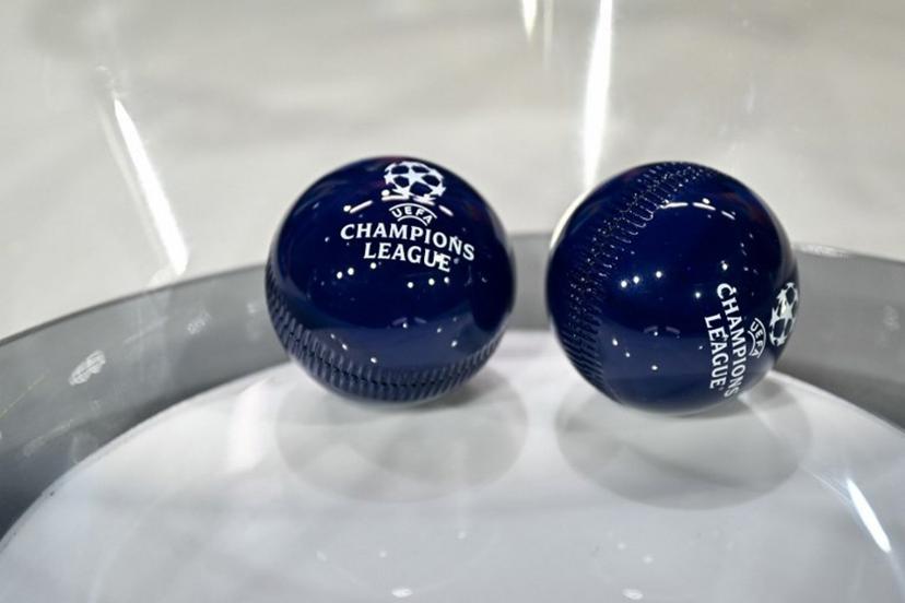 This photograph shows the draw balls bearing the competition logo ahead of the 2025-2026 UEFA Champions League round of 16, quarter-final and semi-final draw at the House of European Football in Nyon, western Switzerland on February 27, 2026. Harold CUNNINGHAM / AFP