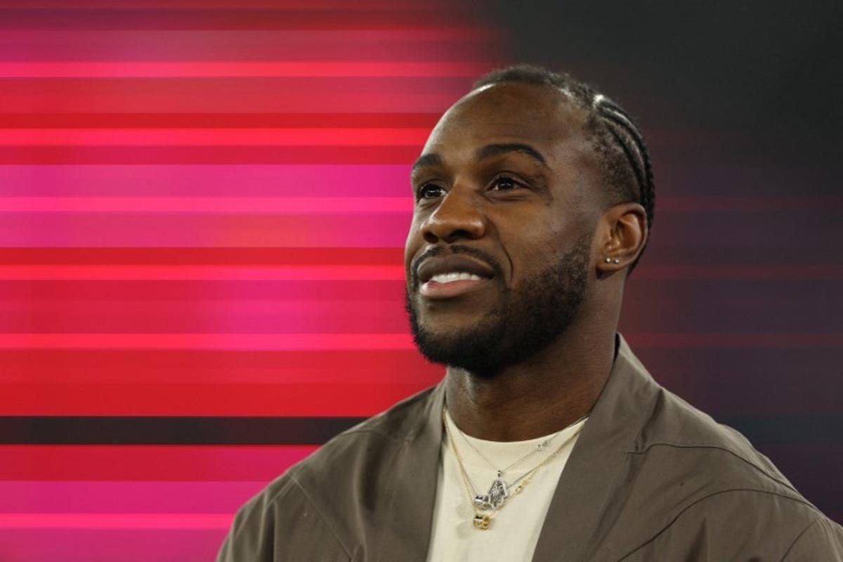 Recovering from car crash injuries, West Ham United's English striker Michail Antonio comes out for the fans ahead of kick-off in the English Premier League football match between West Ham United and Newcastle United at the London Stadium, in London on March 10, 2025. Adrian Dennis / AFP