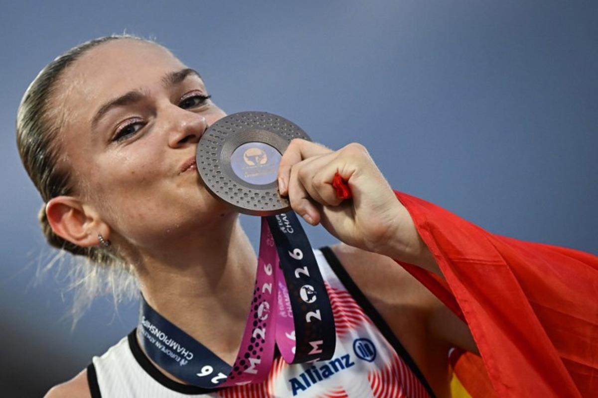 Bronze medallist Belgium's Jana van Lent celebrates after competing in the women's 10,000m final during the European Athletics Championships at Alexander Stadium in Birmingham on August 14, 2026. Paul ELLIS / AFP