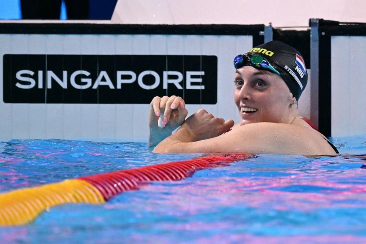 Netherlands' swimmer Marrit Steenbergen reacts after finishing first in a semi-final of the women's 100m freestyle swimming event during the 2025 World Aquatics Championships in Singapore on July 31, 2025. Oli SCARFF / AFP