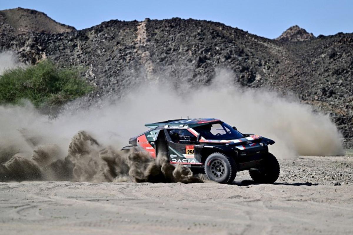 Dacia Sandriders Qatari driver Nasser al-Attiyah assisted by Belgian co-driver Fabian Lurquin compete in the prologue, which determines the starting line-up for the first stage of the 48th edition of the Dakar Rally 2026, between Yanbu and Yanbu, Saudi Arabia, on January 3, 2026. Giuseppe CACACE / AFP